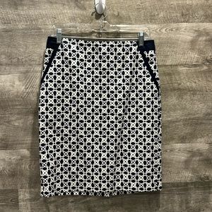 The Limited printed lined Skirt with Pockets, back zipper & Slit.